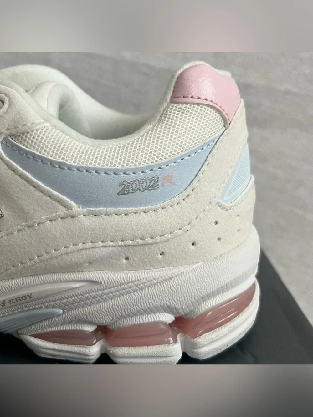 New Balance 2002 White Leather Sneakers with Pale Pink & Light Blue Accents